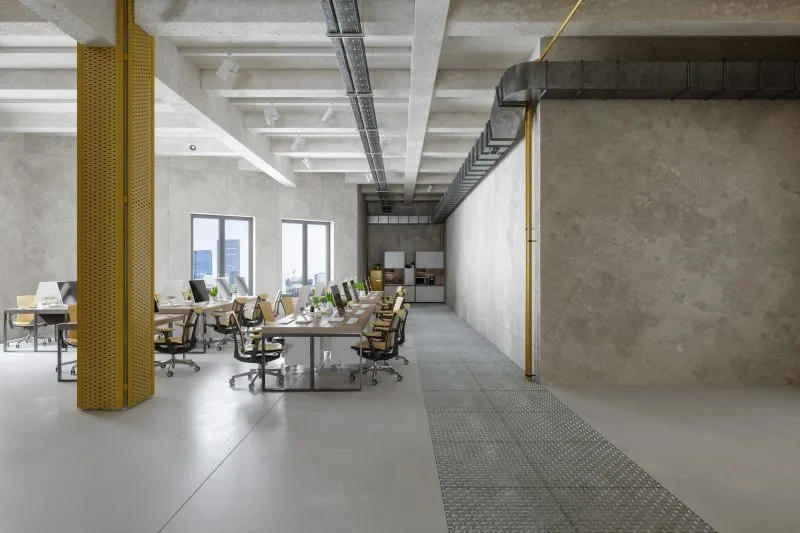 VCT commercial vinyl composition tile flooring in a modern office with yellow chairs by The Flooring Design Center